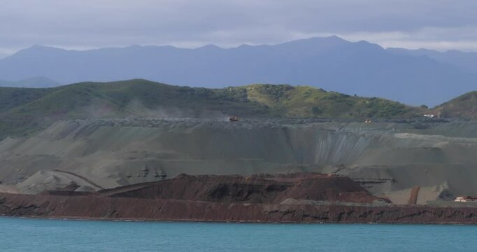 Ore dumps at Doniambo Nickel Smelter Plant, Noumea, New Caledonia.