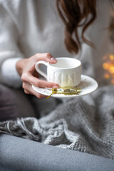  girl drinking cocoa in New Year's decor