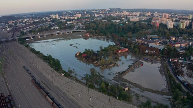 Drone shot over flooded facility and ruined house in Ostrava