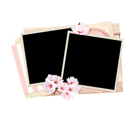 Two retro photo frame and sakura flowers of pink color on vintage envelope and card. Nostalgic...