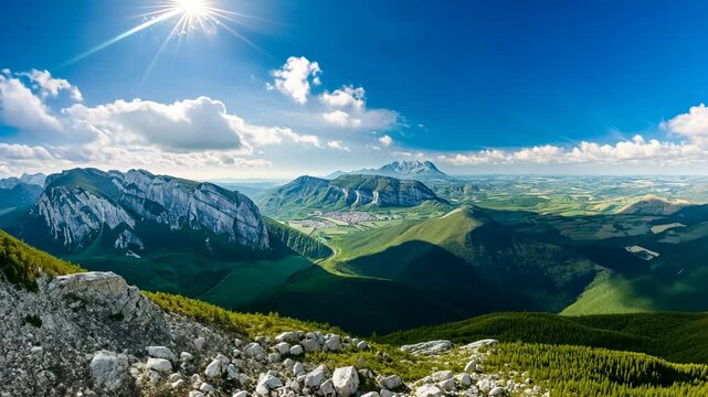 Sun shining over mountain valley landscape