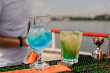 Refreshing Tropical Cocktails Served on a Sunny Day by the Water
