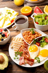 Healthy English Breakfast Assortment with Coffee, Eggs, and Fresh Fruits – Wholesome Meal