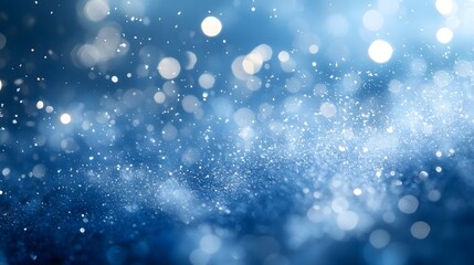 Obraz premium Close-up view of delicate, frost-covered snowflakes with intricate patterns, framed by soft, icy branches. The blurred blue background with falling snow creates a serene, wintery atmosphere.