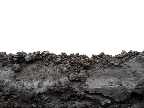Gravel and dirt texture on a black isolated background for design purposes.