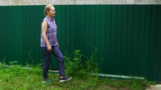 Senior woman walks relaxing outdoor