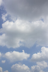 
Blue sky with puffy clouds