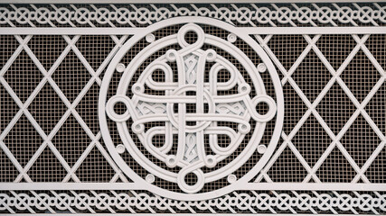 part of an antique stone structure and a fragment of the classical decoration of the building