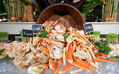 Superbly cooked fresh seafood cold station at International Buffet Restaurant. Prawn, Crab and...