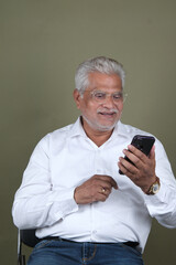 Confident Mature Man Smiling in Casual Attire, Embracing Life's Simplicity and Joy.