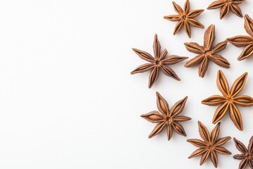 Fototapeta premium Christmas concept of branches with anise on white background. Flat lay, top view with generative ai