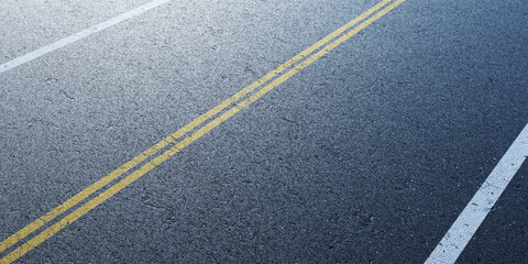 Fototapeta premium Empty road with white and yellow lane markings