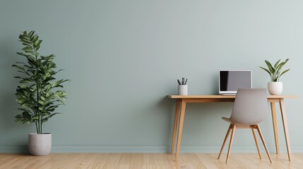 Modern workspace with minimalist design, featuring a wooden desk, computer, and potted plants on a soothing green wall.