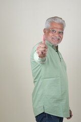 Confident Mature Man Smiling in Casual Attire, Embracing Life's Simplicity and Joy.