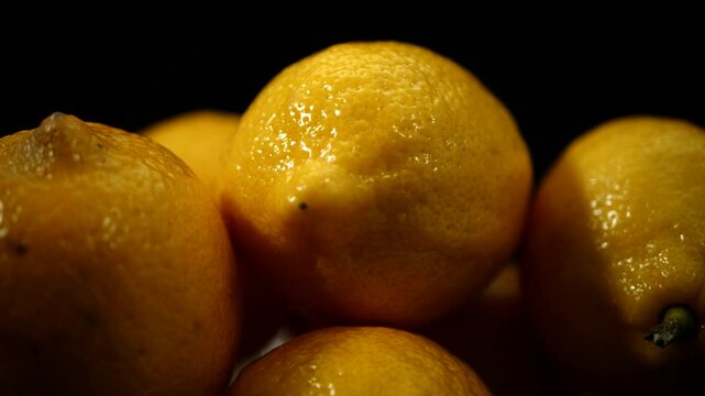 lemons in a bowl, rotating