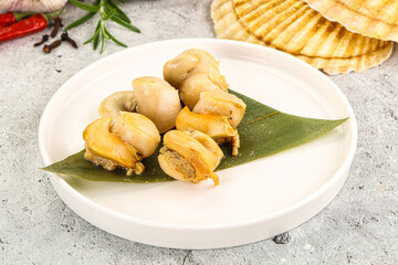 Delicous luxury baked seafood scallops