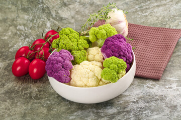 Raw cauliflower different colors heap