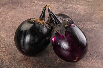Raw violet and black eggplant