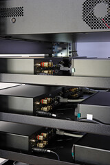 Telecommunication rack with Internet equipment, multimedia amplifiers, video surveillance system....