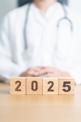 2025 block. Happy New Year for Medical, Health care, Insurance and Wellness concepts