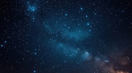 Obraz premium Starry night sky backdrop, vast expanse filled with twinkling stars, ideal for personalized messages or quotes, evokes wonder and connection to the cosmos, serene atmosphere