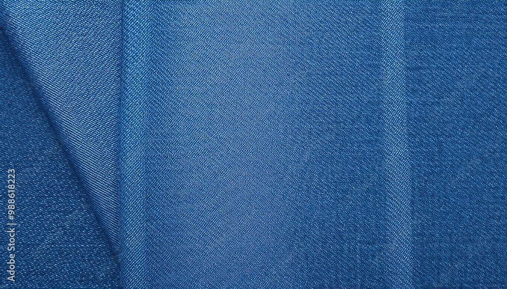 Aufkleber close-up texture of woven blue denim fabric with a slight fade, highlighting fine thread details and