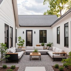Suburban house with a small courtyard, outdoor seating, and a cozy atmosphere