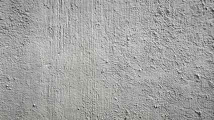 The surface features a rough texture with varying patterns and occasional blemishes, reflecting light subtly. This wall presents an industrial, minimalist aesthetic
