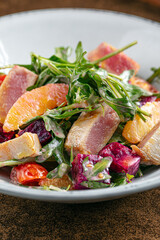 Portion of gourmet tuna salad with arugula