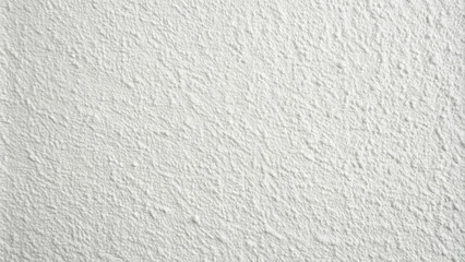 Fototapeta premium A detailed view of a textured white wall presenting a unique grain pattern that enhances its visual interest. This clean surface serves as a versatile backdrop for design projects