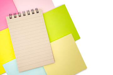 Blank paper note on blank colorful sticky note isolated on white background. Copy space.