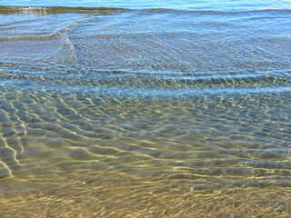 Clear water on sand beach
