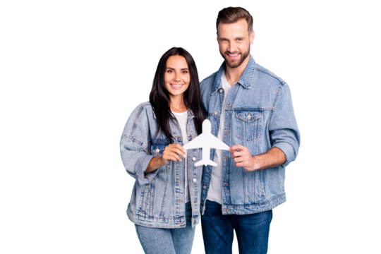 Photo of cute nice charming fascinating couple wearing denim jeans jackets of husband and wife having prepared for summer vacation while isolated with blue background