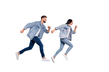 Full length body size photo of funny enjoying nice good cute couple wearing jeans denim clothes having contests at fast running while isolated with blue background