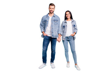 Full length photo of cute people smiling wearing denim jeans jackets isolated over blue background