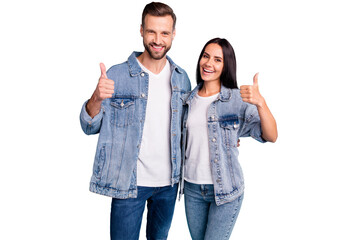 Obraz premium Portrait of pretty sweethearts hugging embracing smiling wearing denim jeans isolated over blue background