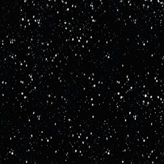 Snowflakes gently falling during a winter evening in a quiet forest setting