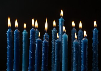 blue candles on a dark background