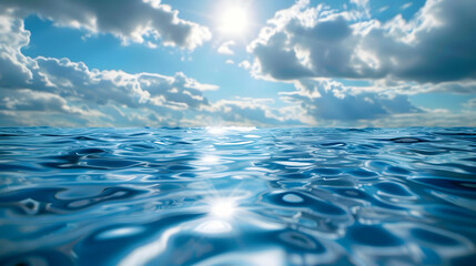 Obraz premium Serene Ocean Landscape: Blue Water, Sun Reflection, and Clouds