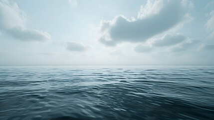 Obraz premium Tranquil Ocean Horizon with Cloudy Sky