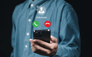Unknown number calling concept. Phone call from stranger. Man answering to incoming call. Phone call from unknown number. Call center gang, scammer or stranger.