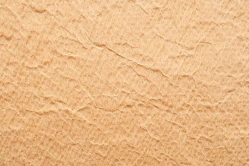 Fototapeta premium Creative light brown rough crumpled paper texture background design.