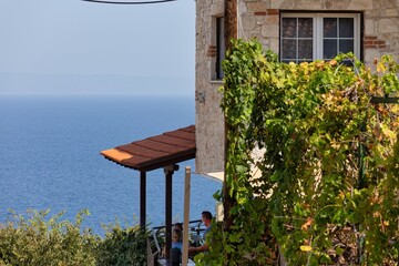 old house with ivy and sea view in Afytos on the Kassandra-Chalkidiki peninsula - Greece