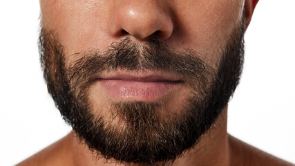 Obraz premium Cropped image of male jaw, bearded face, lips, nose isolated on white studio background. Concept of male beauty, skin care, hygiene