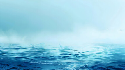 Fototapeta premium Tranquil Ocean Landscape: Blue Water, Mist, and Sky