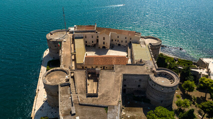 Aerial view of the Aragonese castle, officially called Castel San Angelo, in the historic center of...