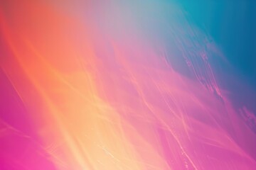 Vibrant gradient of pink, yellow and blue on a gray background