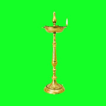 Indian traditional samai or samayee diya or deepam brass lamp burning with transparency - Loop Video for motion graphics