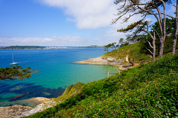 Fototapeta premium From St Anthony Head, across the River Fal estuary to a distant Falmouth in Cornwall.
