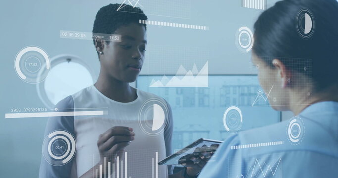 Image of financial data processing over diverse business people in office